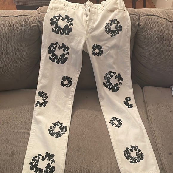 rear white and black size 34 denim tear jeans